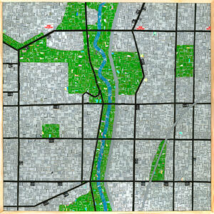 An Image Of A Mosaic Art Piece Made From Metropass Cards. The Mosaic Pieces Form Together To Create A Map Of The Don Valley. Multiple Black Lines Run Through To Represent TTC Lines, While There Is A Green And Blue Part That Runs Down The Middle Of The Image To Represent The Don Valley.