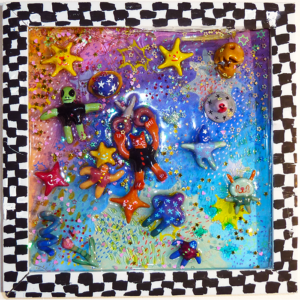 A Piece Of Ceramic Art Featuring A Black And White Chequered Border And A Colourful Swirling Background Filled With Starfish And Colourful Figures.