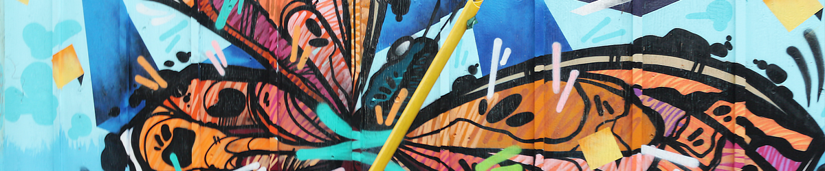 A picture of a mural featuring a vibrant monarch butterfly.