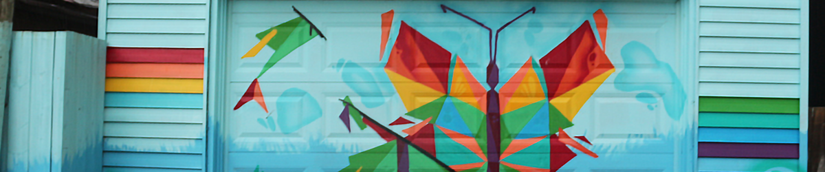A picture of a mural featuring a geometrically styled butterfly.