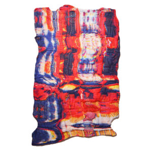 A Flat Lay Photo Of A Vibrant Red And Blue Dyed Textile. It Has Embroidered And Beaded Embellishments.