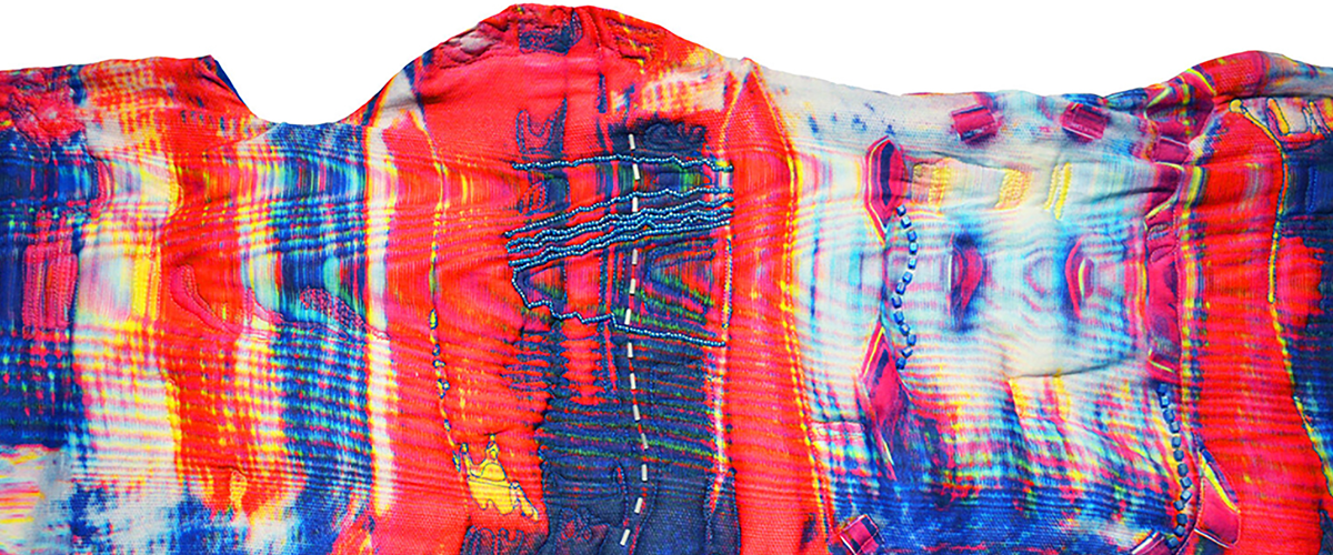 A banner image featuring a colourful red and dark blue textile.